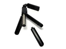 Broken mobile phone tripod isolated on white background with clipping path. Studio shot. photo