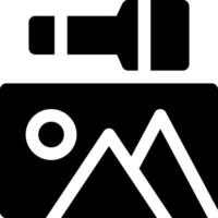 A camera with a flashlight and a mountain vector