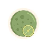 Green pea cream soup with a slice of lime in a bowl vector