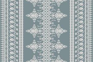 Ikat pattern Ethnic Pattern.Border indian floral Aztec embroidery border seamless patterns on teal background. vector