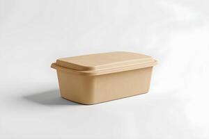 A small container with a lid on a white surface photo