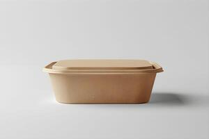 A plastic container with a lid on a white surface photo