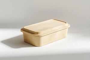 A wooden box with a lid on a white surface photo