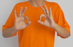 Making the OK sign with both hands. Sing language photo