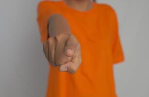 A person pointing with their index finger. Sign language photo