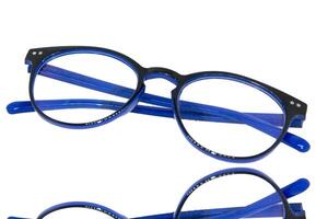Presbyopia and myopia glasses for reading and daily use are eye care and health on white background. photo