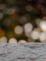 blurred background with soft, circular bokeh lights and a textured foreground. Perfect for serene designs. photo