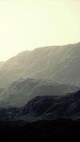 landscape of the Dolomites Mountain Range covered in the fog video
