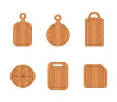 Set of wooden cutting boards. Kitchen tools of various shapes. Top view. illustration in flat cartoon style vector