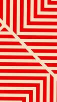 A red and white striped pattern with diagonal lines video