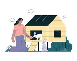 Happy farmer feeds his rabbits fresh hay vector