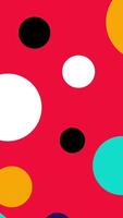 A colorful polka dot pattern on a red background video