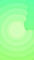 A green and yellow background with a circular pattern video