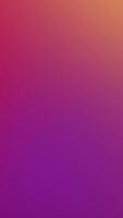 A purple and orange blurred background with a white object video
