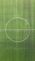 An aerial view of a soccer field with a white line video