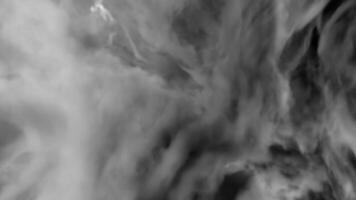 Flying through beautiful stormy thick fluffy clouds. Design. Amazing abstract clouds moving slowly with flashing lightning. video