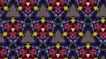 Bright psychedelic pattern with flashing figures. Motion. Pattern with flashing geometric shapes and psychedelic colors. Flashing kaleidoscopic figures with psychedelic effect video
