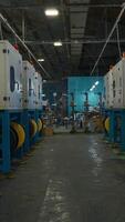 Chemical workshop of metallurgical production. Creative. Rows of production furnaces for melting plastic pellets. Production process of polymer plastic extrusion video