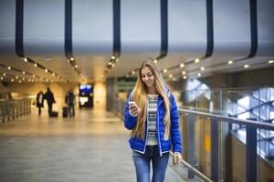 Young woman in international airport photo