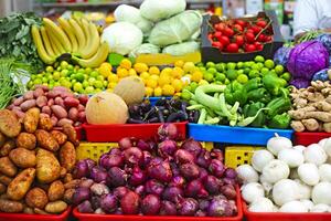 Vegetables and fruits at open air market photo