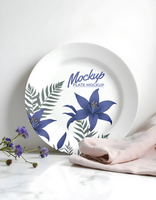 plate mockup with flower and folding fabric background psd