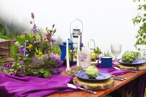 Wedding table setting decorated in rustic style photo