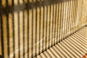 Abstract light and shadow of architecture detail on concrete wall photo