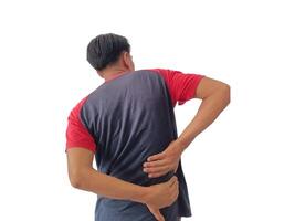 Lower back pain is usually caused by a muscle injury. broken pillow.Isolated on white background photo