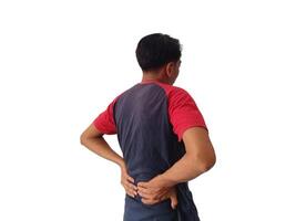 Lower back pain is usually caused by a muscle injury. broken pillow.Isolated on white background photo