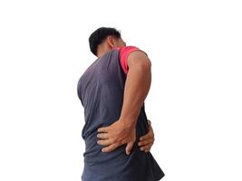 Lower back pain is usually caused by a muscle injury. broken pillow.Isolated on white background photo