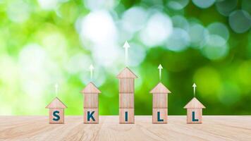 Skill training, Personal development and promoted employee, education, learning, ability, Upskilling and personal development concept, Upskilling, reskilling, new skills on wooden cube. photo