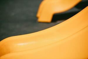 Roller coaster at the children's playground, yellow slide photo