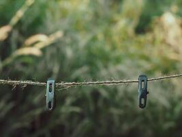 Brown rope on blurred grass background in the garden for copy space photo