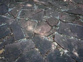 Brown stone floor texture for garden walkway background photo