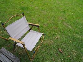 Camping chair on the lawn for a relaxing holiday photo