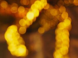 Blurred golden light for an abstract luxury background. photo