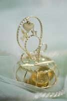 A gold ring on a chain photo
