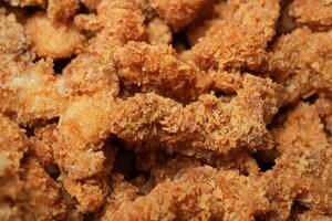 A close up of fried chicken pieces photo