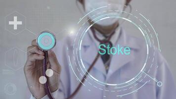 stoke text. Doctor using stethoscope on medicine background. Futuristic technology. data hologram healthy concept. video
