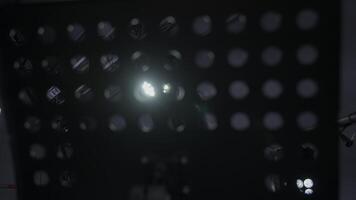 An Intricate Illuminated Grid Pattern Featuring a Strikingly Bright and Radiant Center Light. Clip video