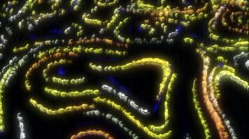 Black background with bright yellow and green backlight. Motion.Bright background with burning particles around in animation. video