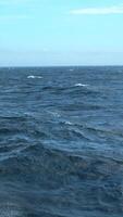 Waves from floating sea vessel. Clip. Beautiful moving waves from floating ship at sea. Beautiful sea horizon with moving waves from ship video