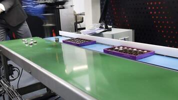 An Automated Conveyor System specifically designed for efficient Chocolate Production in factories. Media video
