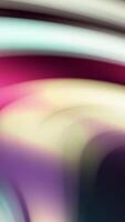 Colorful blurred streams of curving lines. Stock animation. Beautiful blurred lines move slowly like streams of paint. Abstract background of colorful blurred paint lines video