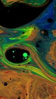 Close up of colorful gradient background of oil paint surface, art concept. Stock footage. Beautiful miround.xed colorful paints, creative background. video