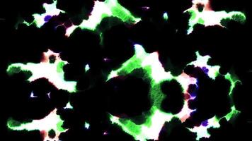 Black background with green and puddles of paint. Motion. Splashing spots in the animation that will spread out. video