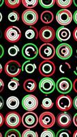 Plenty of small multicolored circles spinning on the black background in different sequence. Animation. Beautiful abstract background. video
