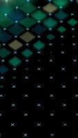 Digital background with colored crosses and squares on black backdrop. Animation. Blurred rows of squares and crosses between them move on black background video