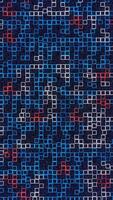 Moving blue and red mosaic on a dark background with grain effect. Media. Small mosaic flickering on digital screen. Vertical . video