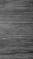 Detailed close-up of a grey wooden texture with natural patterns. Media. Stop motion effect. Vertical . video